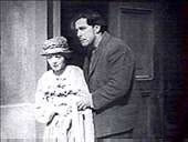 Plano americano o tres cuartos.